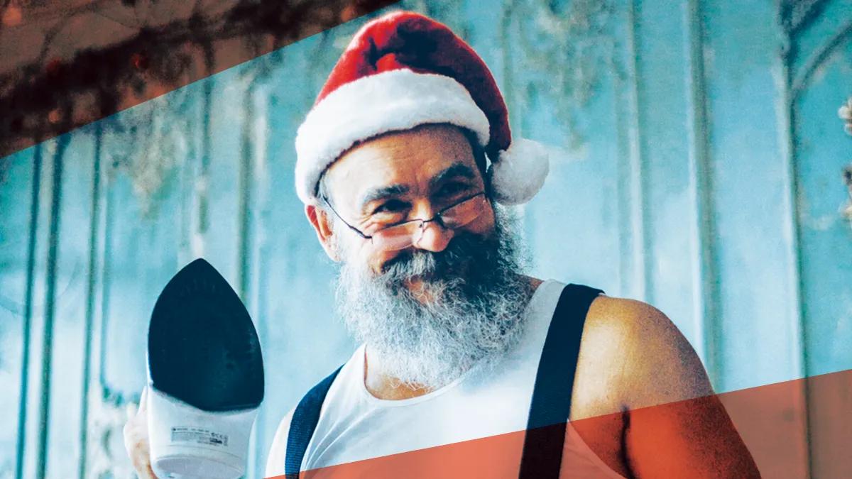 Santa holding and iron.